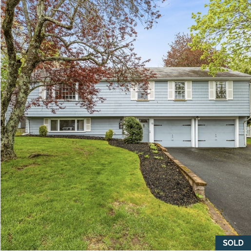 Front exterior of 10 Old Coach Rd in Canton, MA