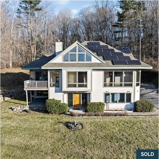 Front exterior of 56 River Rd in Merrimac, MA