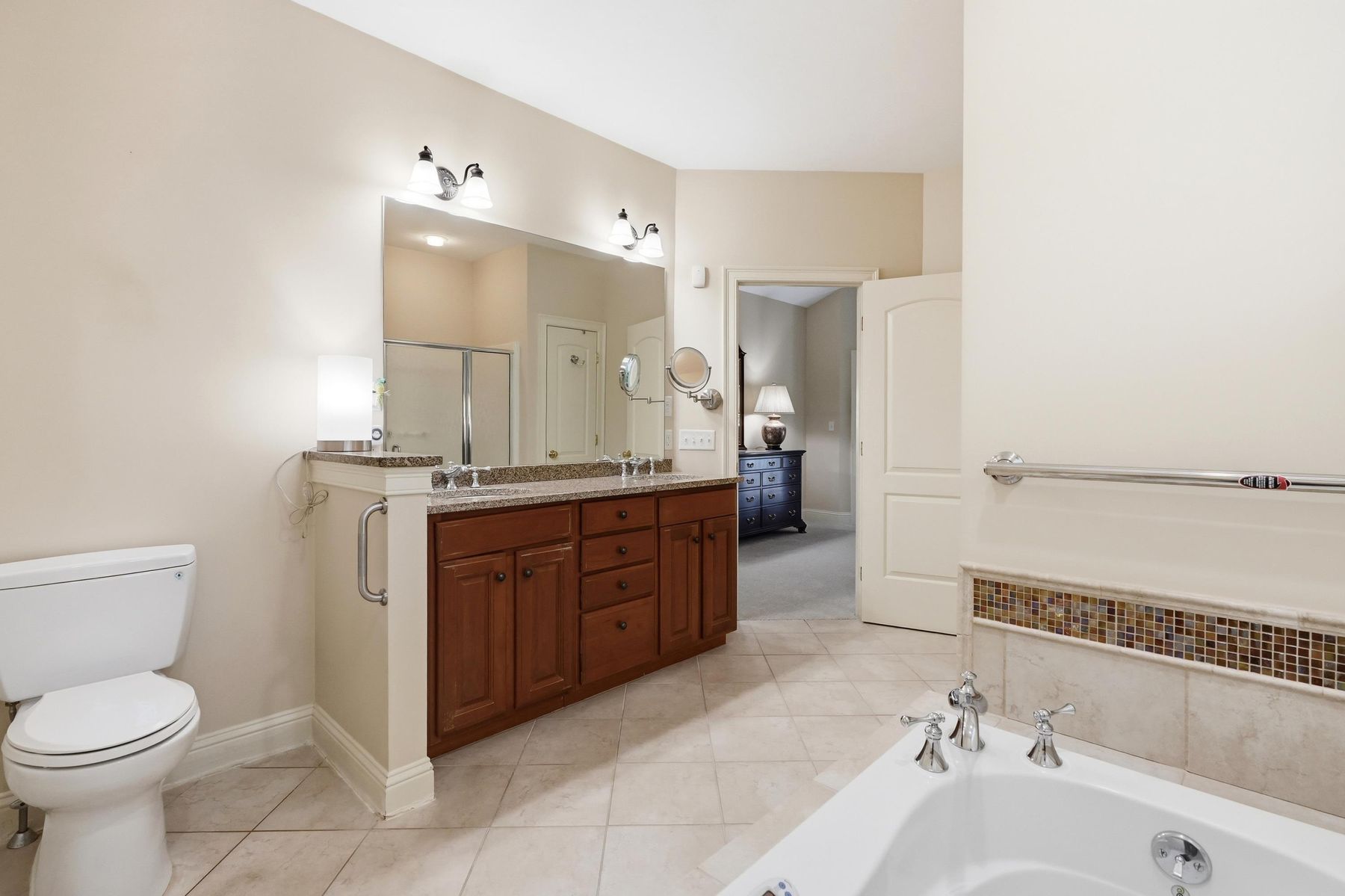 Primary bath vanity and soaking tub
