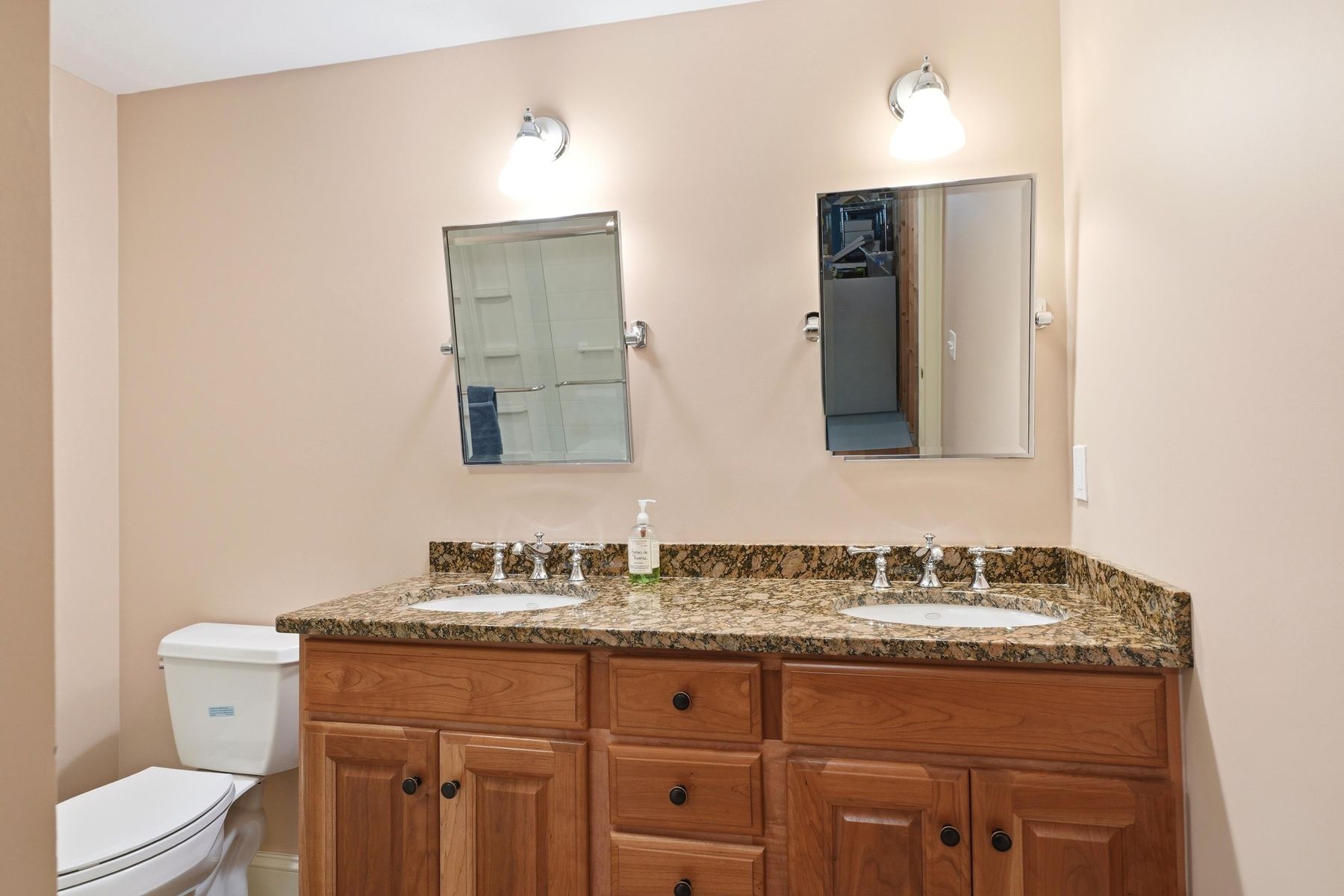 Additional full bath with granite double vanity