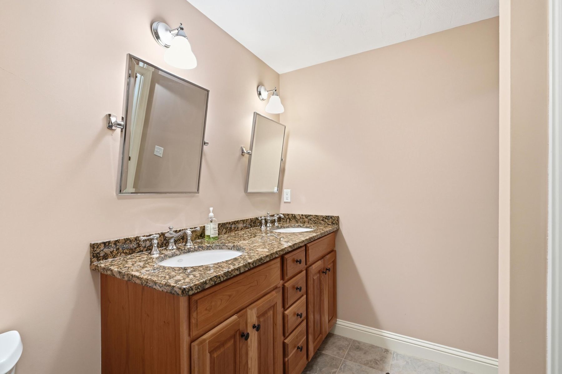 Full bath vanity with framed mirrors