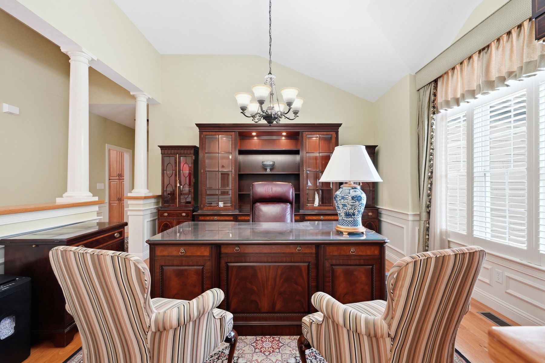 Home office with desk and seating area
