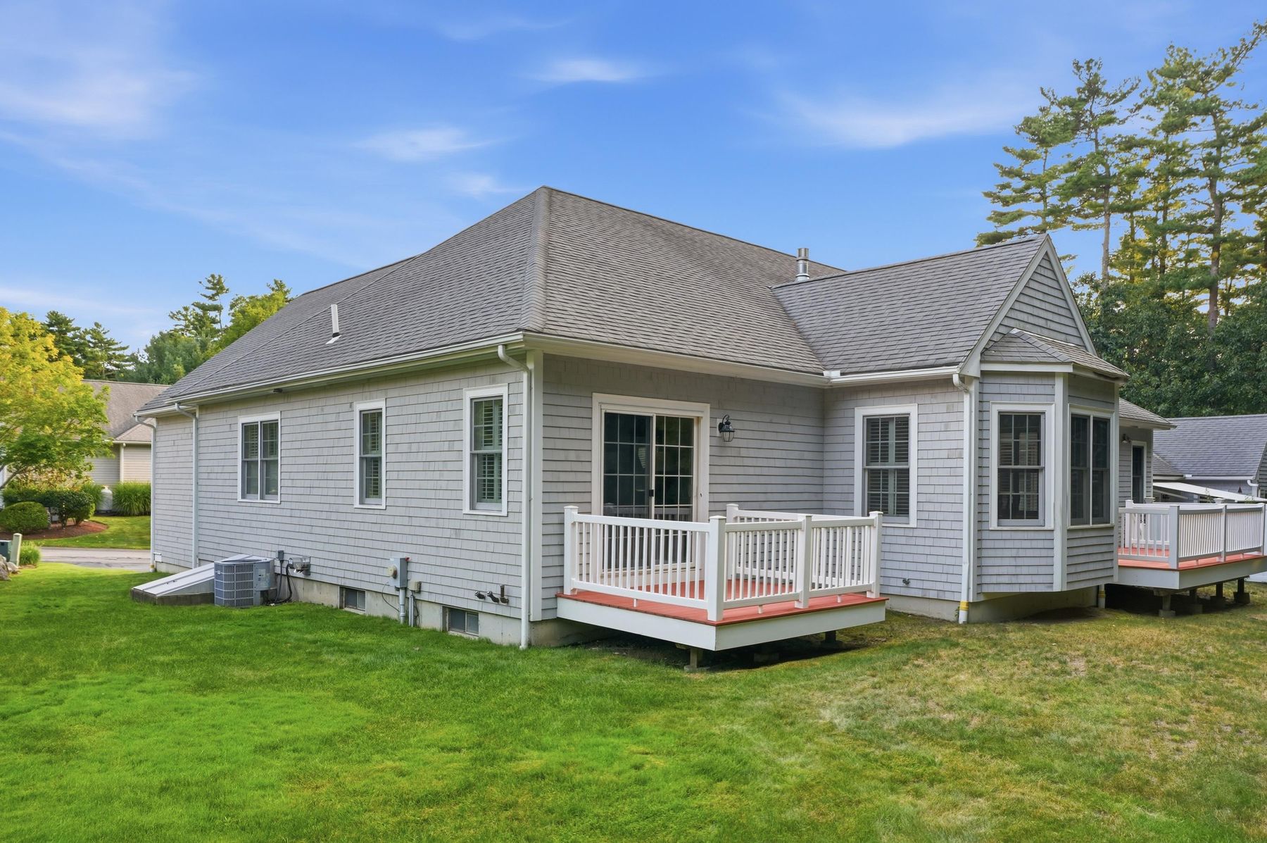 Rear exterior of the home and lawn