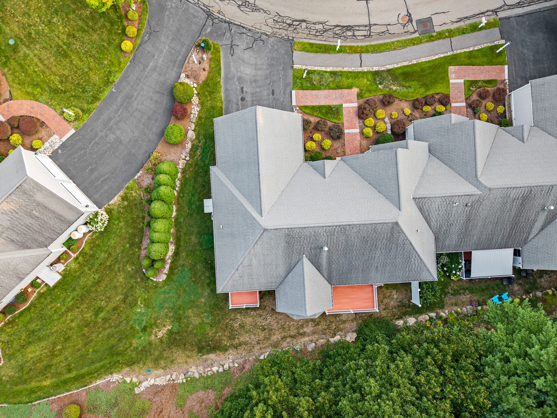 Aerial drone view directly over the home and driveway